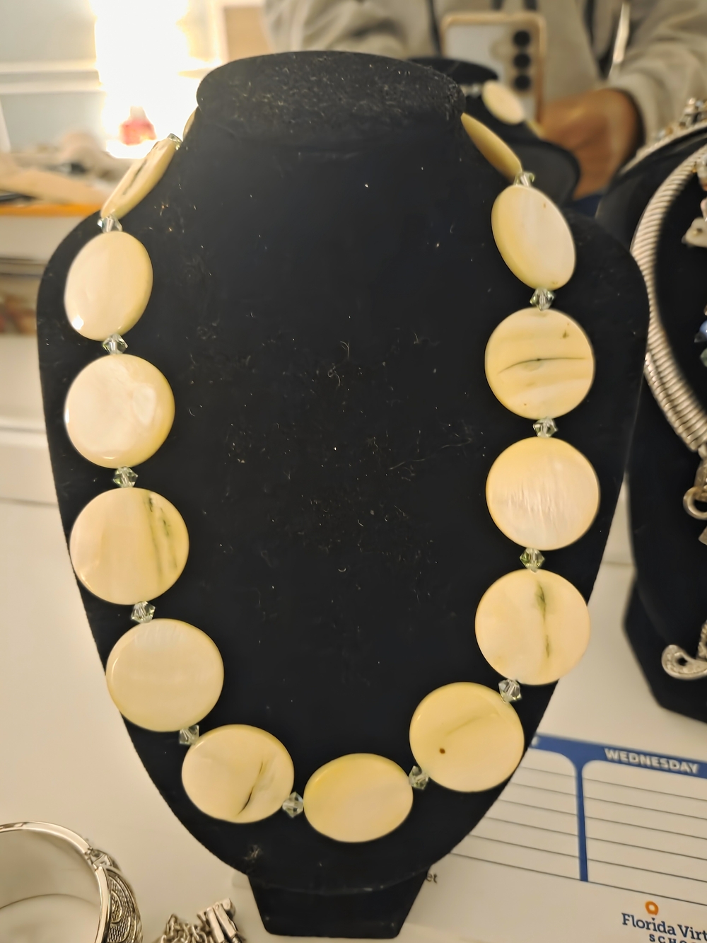 Elegant Cream Round Shell Necklace with Pale Green Accents